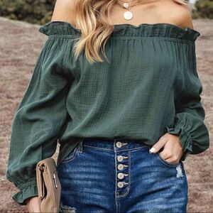 67. Ruffle hem off shoulder blouse green, black, or tan
